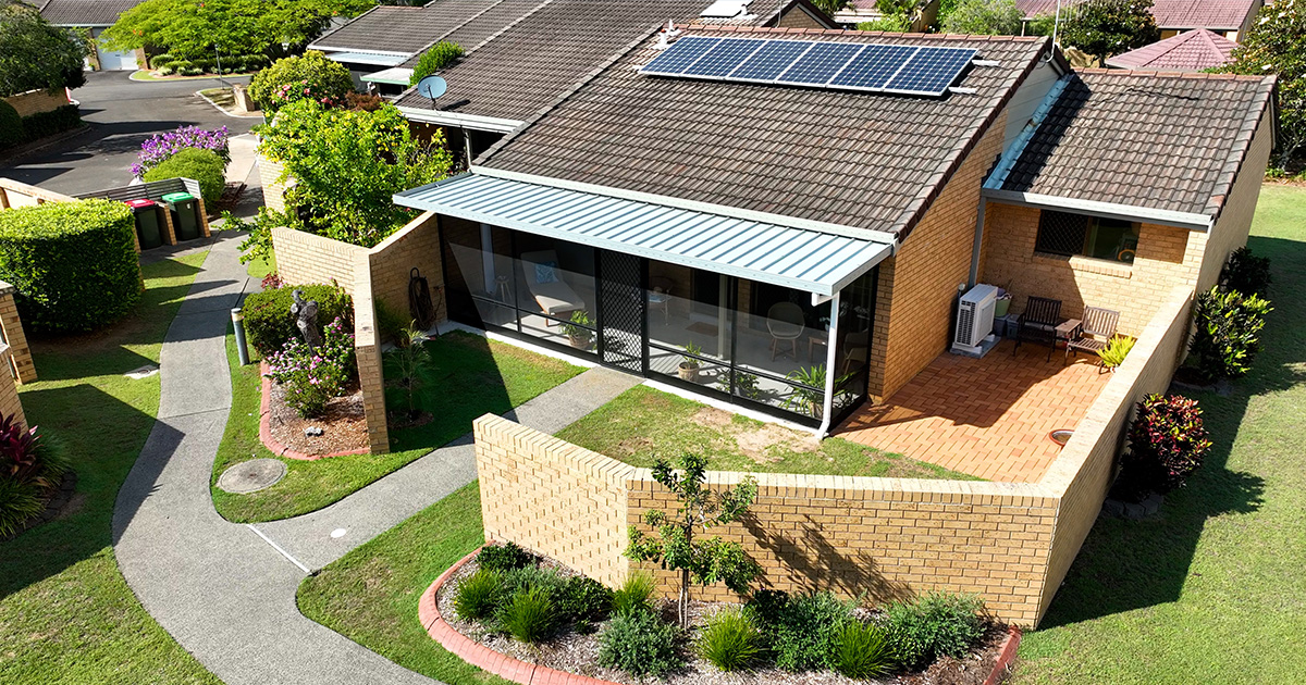 aerial view of crowley villa with screen room and private courtyard